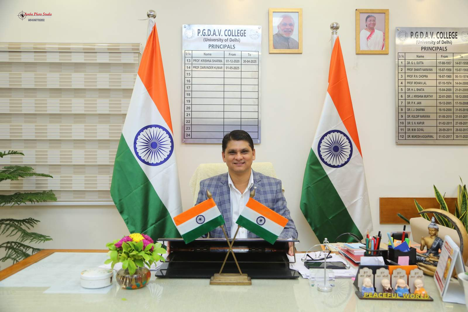 Prof. Darvinder Kumar, Principal, P.G.D.A.V. College, at his desk